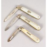 THREE SILVER AND MOTHER-OF-PEARL FRUIT KNIVES.