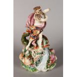 A DERBY GROUP, "NEPTUNE WITH A DOLPHIN", on a shell encrusted base, 10ins high, (hand missing).