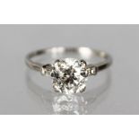 A PLATINUM MOUNTED SINGLE STONE DIAMOND RING of 2.2cts, SI clarity.