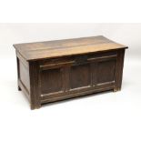 AN 18TH CENTURY OAK DOWER CHEST, with plain rising top, three plain panels to the front. 3ft 6ins