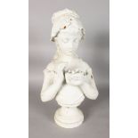 A PARIAN WARE BUST OF A PRETTY YOUNG GIRL holding a birds nest. 20ins high.
