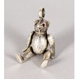 A NOVELTY SILVER TEDDY BEAR.