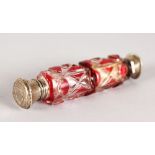 A VICTORIAN DOUBLE ENDED RUBY GLASS SCENT BOTTLE with silver top. 4.5ins long.