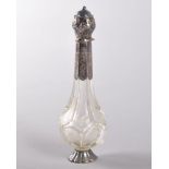 A DUTCH 19TH CENTURY BALUSTER SHAPED CLEAR GLASS PERFUME BOTTLE with silver top and foot. 11.5cms.