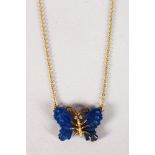 AN 18CT GOLD LAPIS BUTTERFLY NECKLACE.