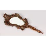 A BRONZE HAND MIRROR with cherubs. 14ins long.