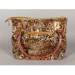 A BUTLER & WILSON LEOPARD PRINT BAG AND PURSE. 11ins x 13ins.