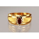 AN 18CT YELLOW GOLD, RUBY AND DIAMOND RING.