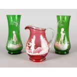 A SMALL PAIR OF MARY GREGORY GREEN VASES, decorated with a boy and girl in white, 7ins high, and A