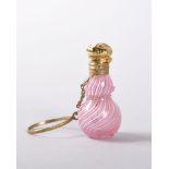 A MINIATURE FRENCH CLICHY STRIPED GLASS PERFUME BOTTLE with silver gilt stopper and chain.