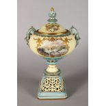 A LOCKE & CO WORCESTER TWO HANDLED URN ON STAND, the lid with 'C' vignette of a river, the body of
