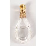 A CUT CRYSTAL GOLD MOUNTED SCENT BOTTLE. 12cms long.