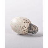 A JAMES MACINTYRE & CO BURSLEM WHITE PORCELAIN EGG SHAPED SCENT BOTTLE with silver screw top as a