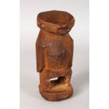 A LOSSO TOGO CARVED WOOD FIGURE. 8ins high.