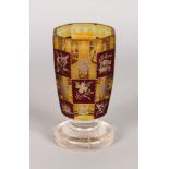 A 19TH CENTURY BOHEMIAN OCTAGONAL GOBLET with panels etched with motifs, pig, shamrocks, etc. 5ins