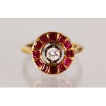 AN 18CT GOLD, RUBY AND DIAMOND RING.
