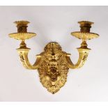 A GOOD HEAVY FRENCH ORMOLU TWO-LIGHT WALL SCONCE and two shades.