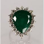 A SUPERB LARGE 18CT WHITE GOLD HEART SHAPED EMERALD AND DIAMOND RING.