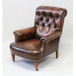 A GOOD LEATHER BUTTONED BACK ARMCHAIR on turned legs with castors.