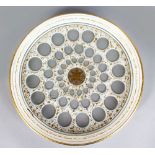 A BOHEMIAN WHITE AND GILT OVERLAY CIRCULAR DISH. 11ins diameter.