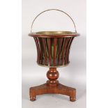 A DUTCH MAHOGANY JARDINIERE, with brass liner, slatted supports on a concave sided base. 1ft 6ins
