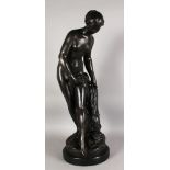 A GOOD LARGE BRONZE CLASSICAL FEMALE NUDE, standing next to a pillar, on a marble base. 2ft 10ins