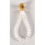 A CUT CRYSTAL GOLD MOUNTED SCENT BOTTLE. 10.5cms long.