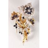 A SUPERB LARGE 18CT YELLOW GOLD, DIAMOND AND SAPPHIRE SET FLOWER BROOCH, 8.5cms long, set as a spray