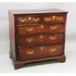 A GOOD 18TH CENTURY OAK STRAIGHT FRONT CHEST of two short and three long graduated drawers with