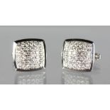 A PAIR OF DIAMOND CUFFLINKS of over 2cts.
