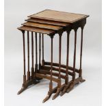 A GOOD NEST OF MAHOGANY QUARTETTO TABLES, with plain rectangular tops, turned legs and curving feet.