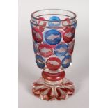 A GOOD 19TH CENTURY BOHEMIAN CIRCULAR GOBLET, etched with panels of fish in red and blue. 5.5ins