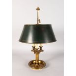 A GOOD TOLE LAMP with three candle sconces and green tole shade.