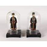 A GOOD PAIR OF RUSSIAN COLD PAINTED BRONZE BODYGUARDS in dress parade uniform, inscribed on the