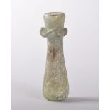 A ROMAN GLASS PERFUME BOTTLE, CIRCA. 200AD, with a scroll decorating the neck. 7cms long.