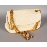 A BUTLER & WILSON CFREAM HANDBAG, with chain handle. 7ins x 12ins.