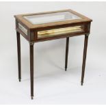 A GOOD 19TH CENTURY MAHOGANY RECTANGULAR BIJOUTERIE TABLE, with glass rising top, baize interior and