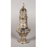 A GOLDSMITHS & SILVERSMITHS COMPANY WRYTHEN FLUTED SUGAR CASTER. 7.5ins high. London 1906.