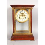 AN UNUSUAL WOODEN CASED FOUR GLASS REGULATOR MANTLE CLOCK, circular enamel dial, visible escapement,