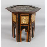 AN OTTOMAN INLAID OCTAGONAL TABLE with Islamic Script. 20ins high, 21ins wide.