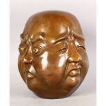 AN AMUSING BRONZE SCULPTURE, modelled as a four face Buddha. 8ins high.