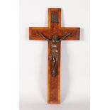 A 19TH CENTURY FRENCH BRONZE CRUCIFIX. Signed on reverse on a walnut cross. 17ins long.