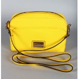 A YELLOW TIGNANELLO HANDBAG.