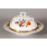 A DRESDEN TYPE CIRCULAR MUFFIN DISH AND COVER painted with flowers.
