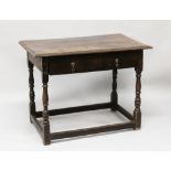 AN 18TH CENTURY OAK SIDE TABLE, with one long drawer, brass drop handles, and supported on turned