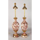 A GOOD PAIR OF FRENCH LOUIS XVI DESIGN VEINED MARBLE URNS, with ormolu mounts converted to lamps.