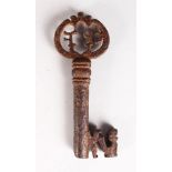 A GOOD 17TH CENTURY IRON KEY with pierced handle, initials CPF. 5ins long.