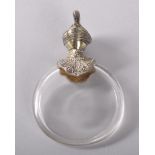 A FRENCH CLEAR GLASS PERFUME BOTTLE with silver gilt mounts and stopper depicting a man, head and