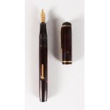 A CONWAY STEWART FOUNTAIN PEN with 14K NIB.