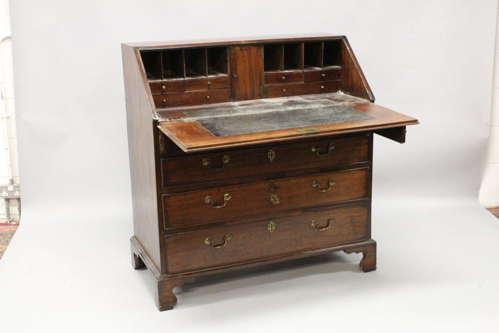 A GEORGE III MAHOGANY BUREAU, with fall front, fitted interior over four long graduated drawers with - Image 2 of 2